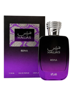 A bottle of Nawas Reina Eau de Parfum next to its packaging box. The perfume bottle is dark purple with a silver cap, and the box features a black and purple gradient with a patterned purple label.