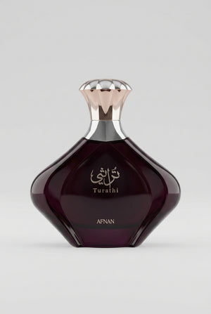 Afnan Turathi perfume bottle on a colorful geometric background