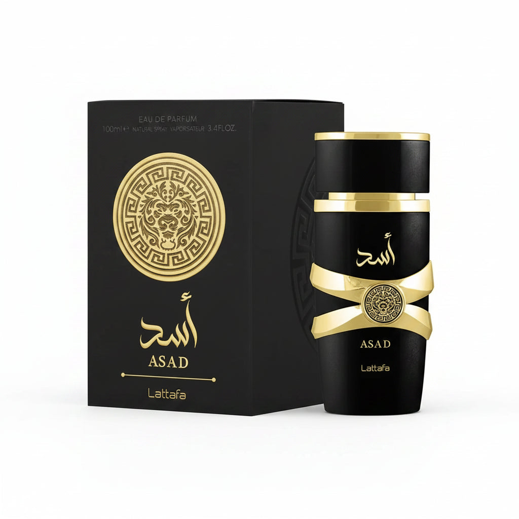 Black and gold perfume bottle with packaging on a white background