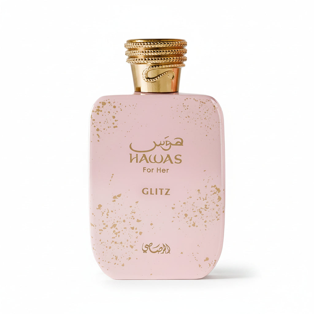 A pink rectangular perfume bottle with gold speckles and a gold cap, labeled 'HAWAS For Her' and 'GLITZ' on a plain white background.