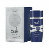 Blue perfume bottle with silver accents and packaging on a white background
