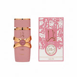 Pink Lattafa Yara perfume bottle with matching packaging on a white background