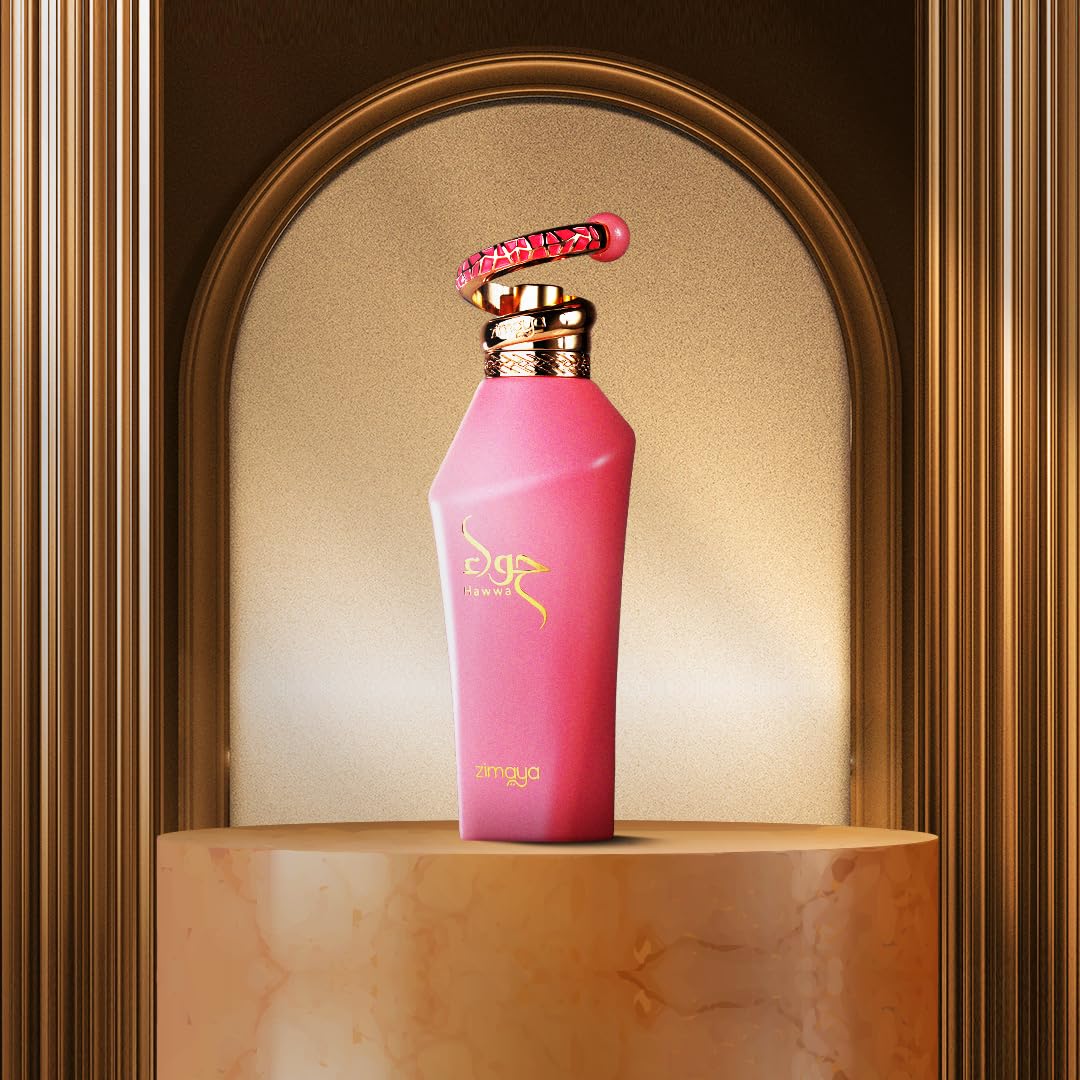 Pink perfume bottle with gold cap on a marble pedestal against a gold archway